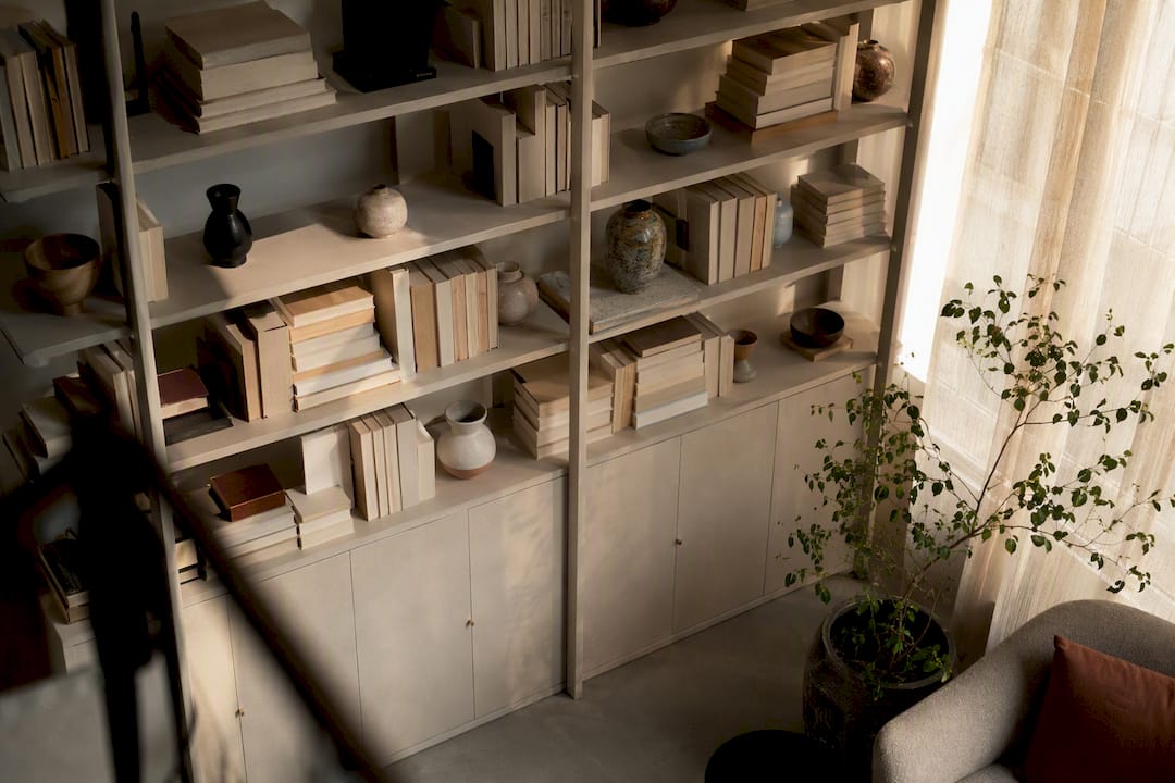 Curated bookshelf styling with books and objects