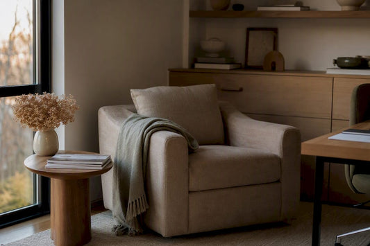 Throw blanket draped over sofa arm