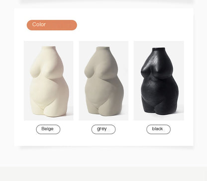 Three colour options for a body shaped vase: beige, grey, and black.