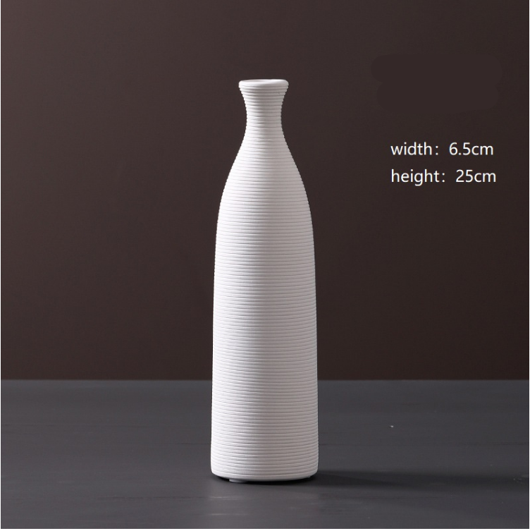 White textured vase on a dark background with measurements displayed.