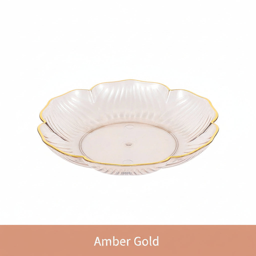 White floral-patterned dish with gold rim on a white background