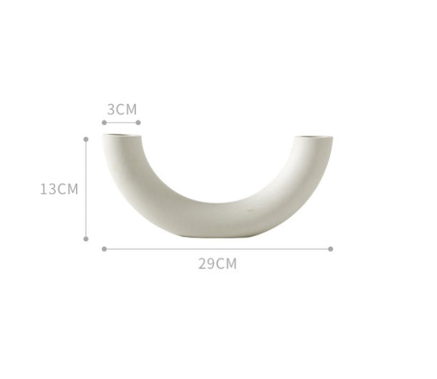 White decorative arch with measurements on a white background
