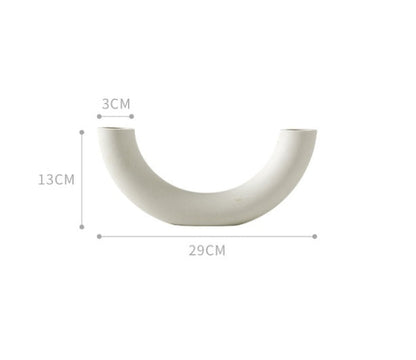 White decorative arch with measurements on a white background