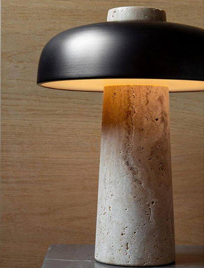 Table lamp with black shade and concrete base