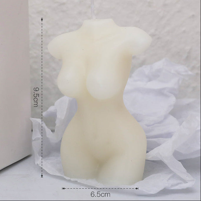 Candle shaped like a female torso with measurements and text on a white background