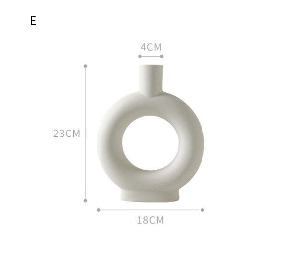 White vase with dimensions labeled on a white background