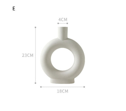 White vase with dimensions labeled on a white background